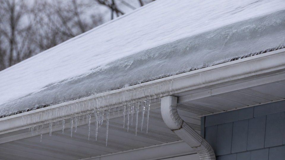 Ice dams forming at the eave of a Connecticut roof
