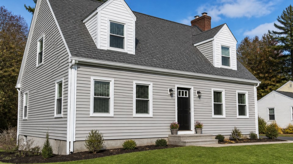Vinyl siding installation on a Connecticut coastal home