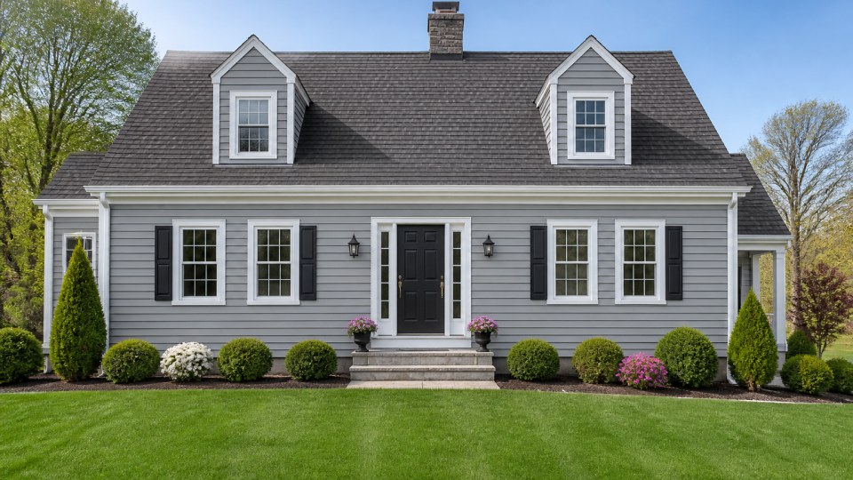 Vinyl siding installation on a Connecticut coastal home