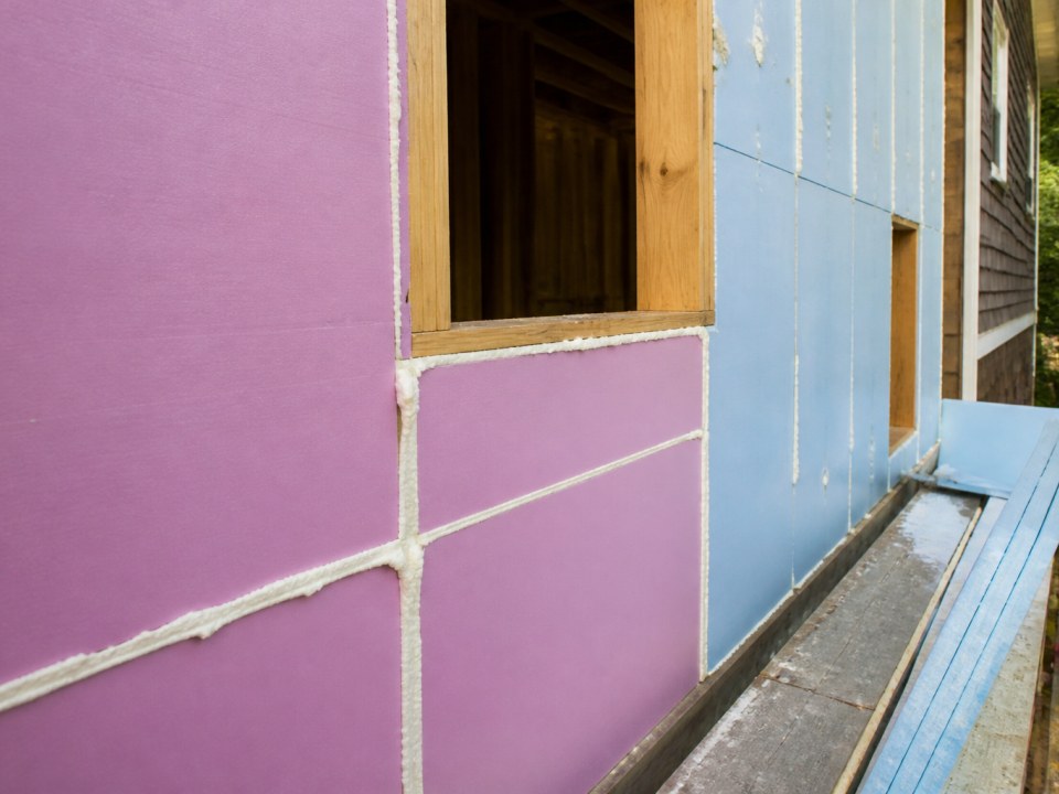 Wall insulation and air barrier details during siding replacement
