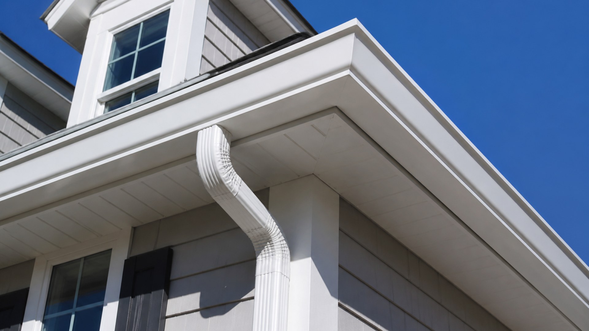 Six-inch seamless aluminum gutters on a Connecticut home